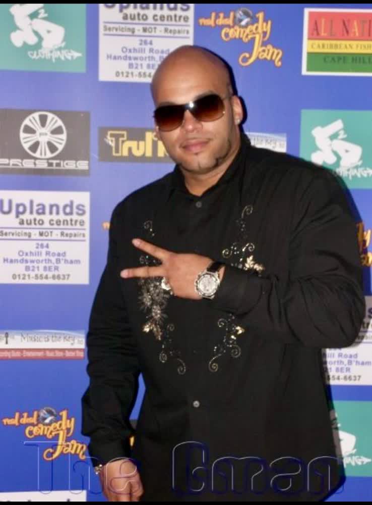 Unify Africa Entertainment host on the event press wall